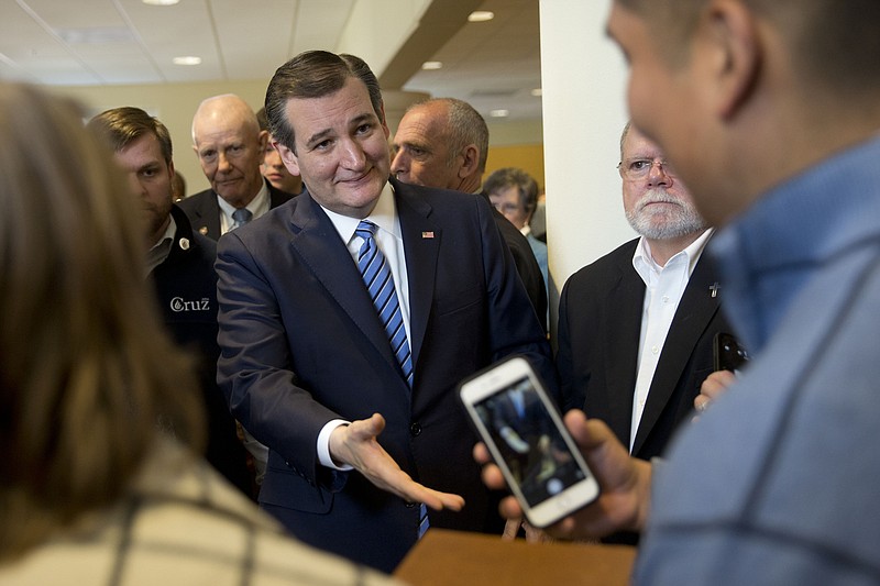 
              Republican presidential candidate Sen. Ted Cruz, R-Texas, meets with parishioners Sunday, Feb. 14, 2016, after speaking during services at a Community Bible Church in Beaufort, S.C. (AP Photo/Matt Rourke)
            