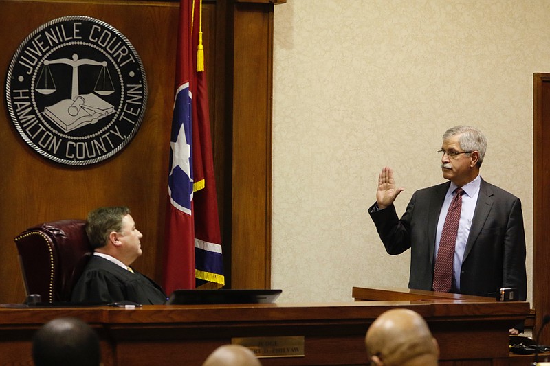 Superintendent of Hamilton County Schools Rick Smith is sworn in as a witness before Judge Robert Philyaw during a preliminary hearing for the Ooltewah High School basketball coaches and the school's athletic director in Hamilton County Juvenile Court on February 25, 2016. Hamilton County District Attorney Neal Pinkston charged head coach Andre "Tank" Montgomery, assistant coach Karl Williams and Athletic Director Allard "Jesse" Nayadley with failing to report child abuse or suspected child sexual abuse in connection with the rape of an Ooltewah High School freshman by his basketball teammates Dec. 22.
