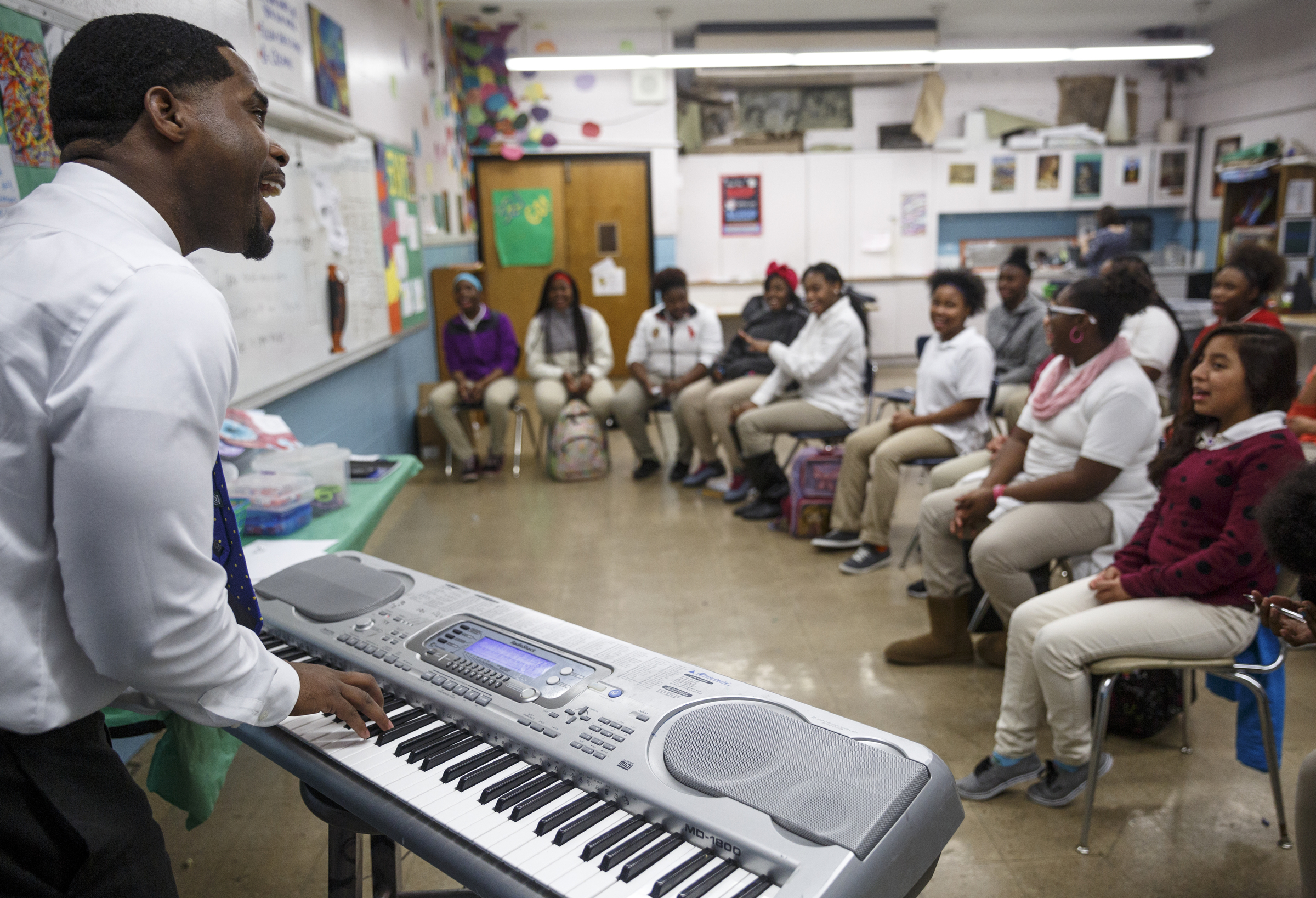 Marcellus Barnes leads students in a choir lesson at Orchard Knob Middle School on Tuesday, Feb. 16, 2016, in Chattanooga, Tenn. Barnes is hosting his 10th annual Sounds of Unity concert in recognition of Black History Month at Abbas House on Feb. 27.