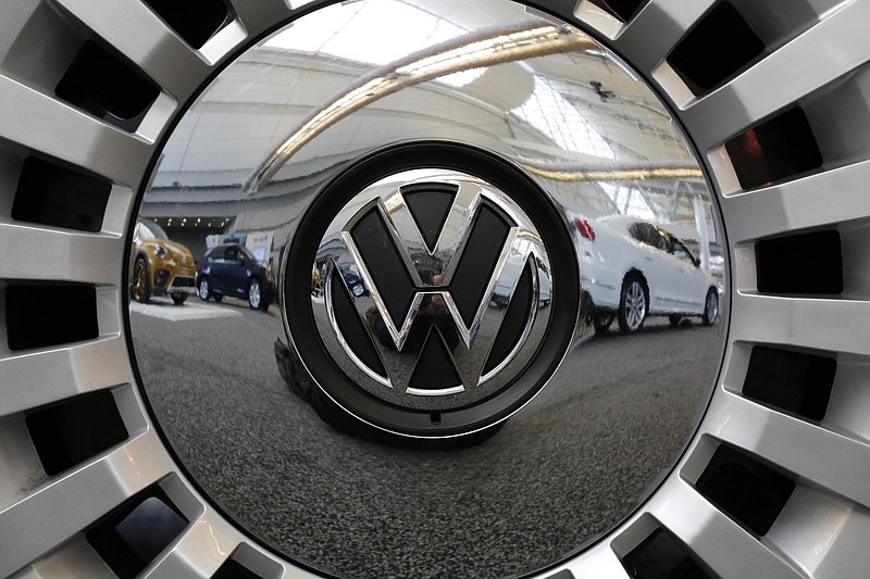 This is the Volkswagen logo the hubcap on a Volkswagen automobile on display at the Pittsburgh International Auto Show in Pittsburgh Thursday, Feb. 11, 2016. (AP Photo/Gene J. Puskar)