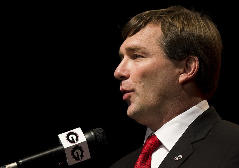 New Georgia football coach Kirby Smart is working to increase the mass of the Bulldogs' lines and the height of their receiver corps.