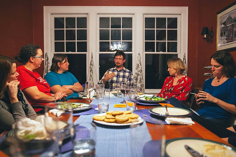 Community members share.a meal and discuss their thoughts on Chattanooga's education issues, using Causeway's Gather Round toolkit.