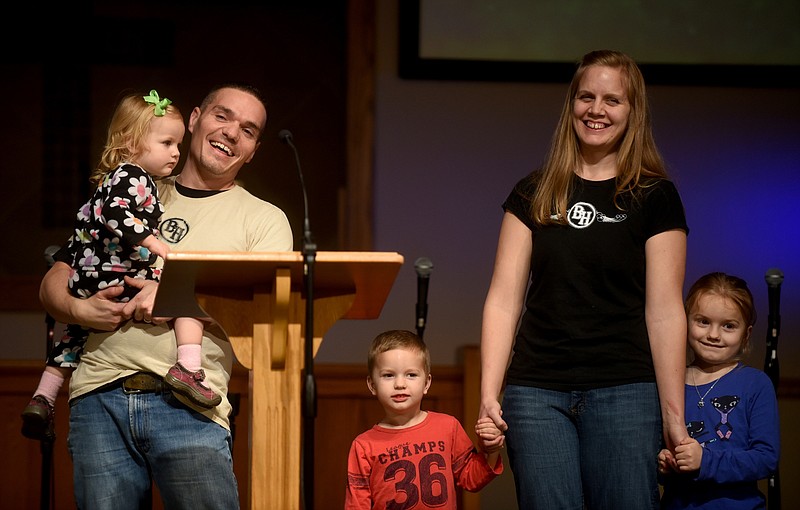 David and Jo Haggard, with kids Dakota, Josiah and Jordyn, from left, speak Wednesday, February 3, 2016 at Mile Straight Baptist Church.February