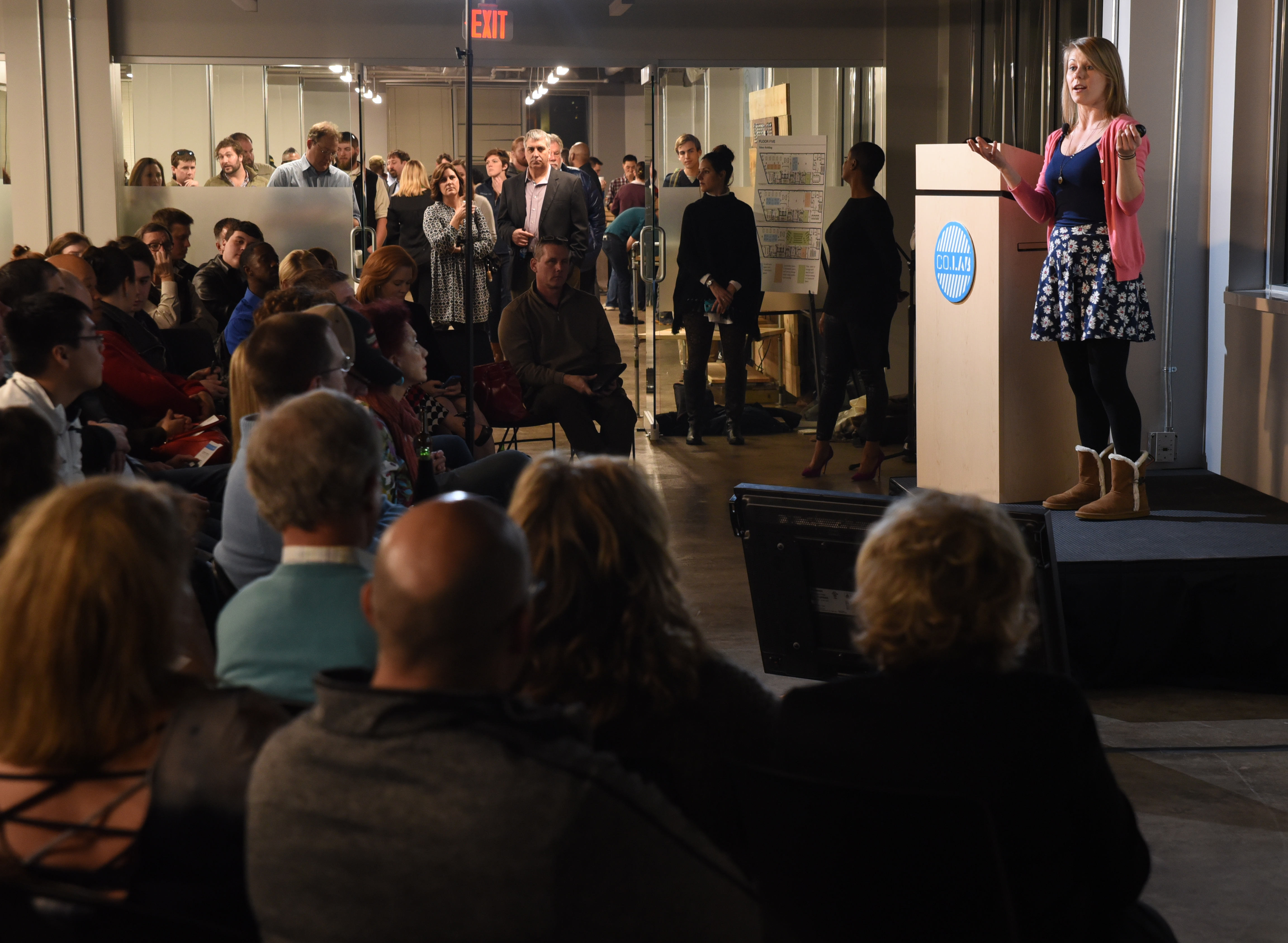 Tiffany Malapanes talks about her herbal tea business, Positiffitea, on Jan. 27 at Co.Lab's Pitch Night to a crowd that gathered for the event at the fifth floor of the Edney Building.