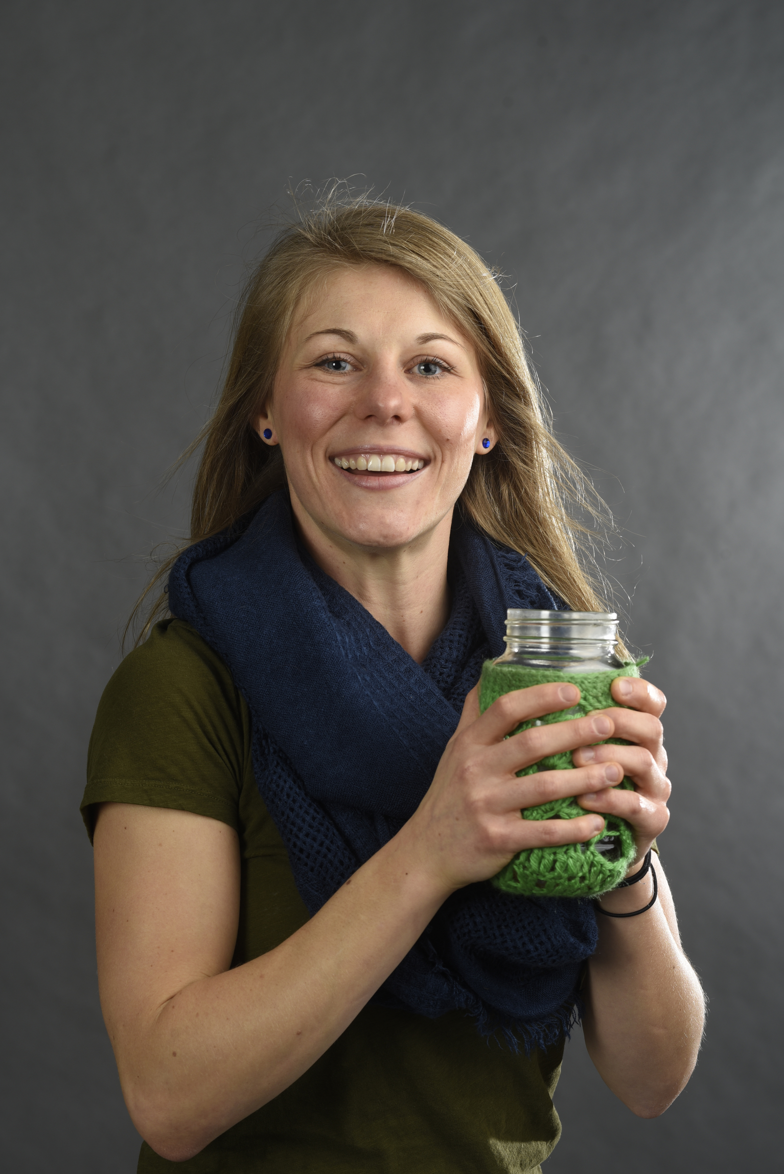 Photographed Monday, Feb. 1, 2016, in Chattanooga, Tenn., Tiffany Malapanes , the founder of Positiffitea, drinks her tea from a canning jar cushioned in a crocheted sleeve.