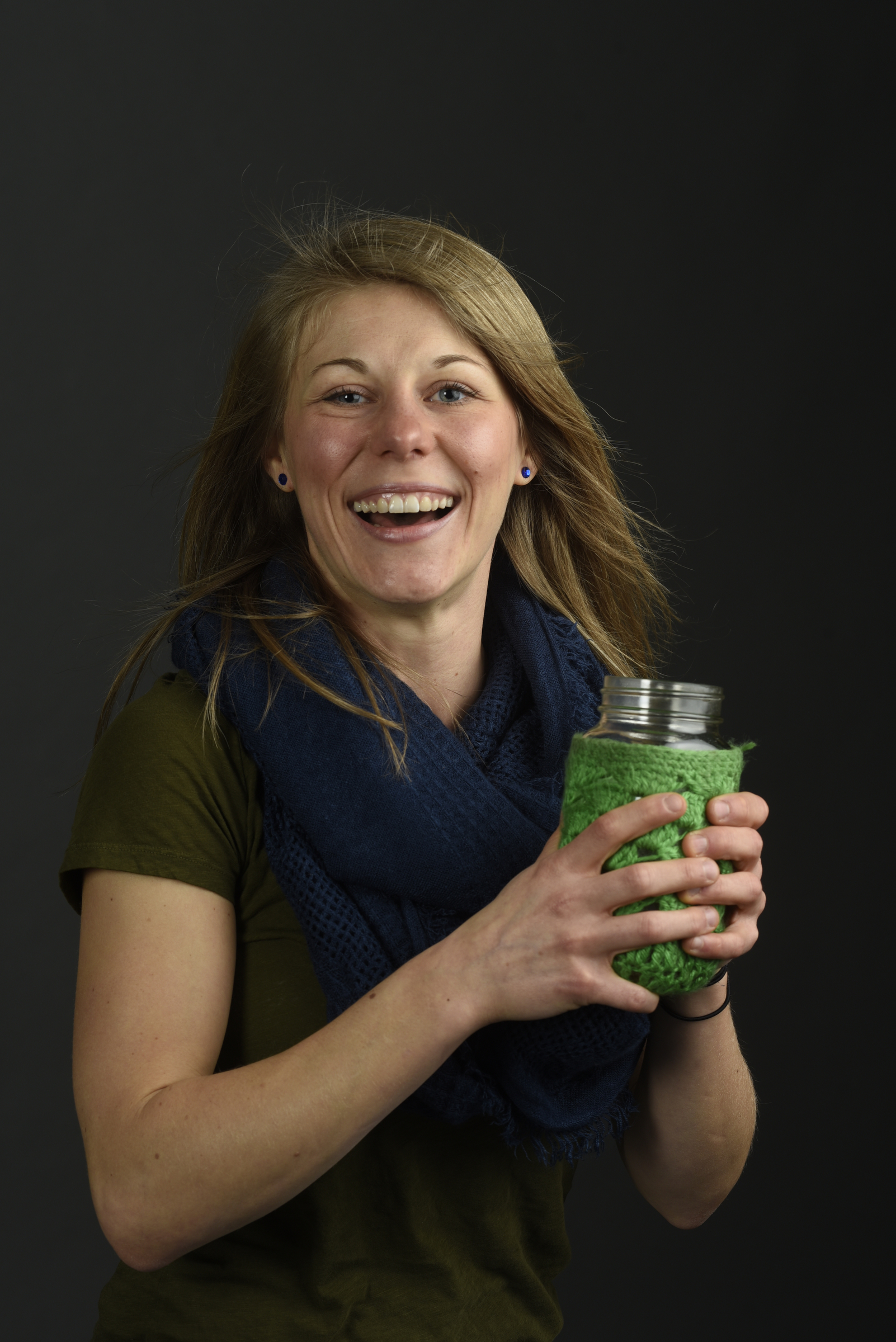 Photographed Monday, Feb. 1, 2016, in Chattanooga, Tenn., Tiffany Malapanes , the founder of Positiffitea, drinks her tea from a canning jar cushioned in a crocheted sleeve.