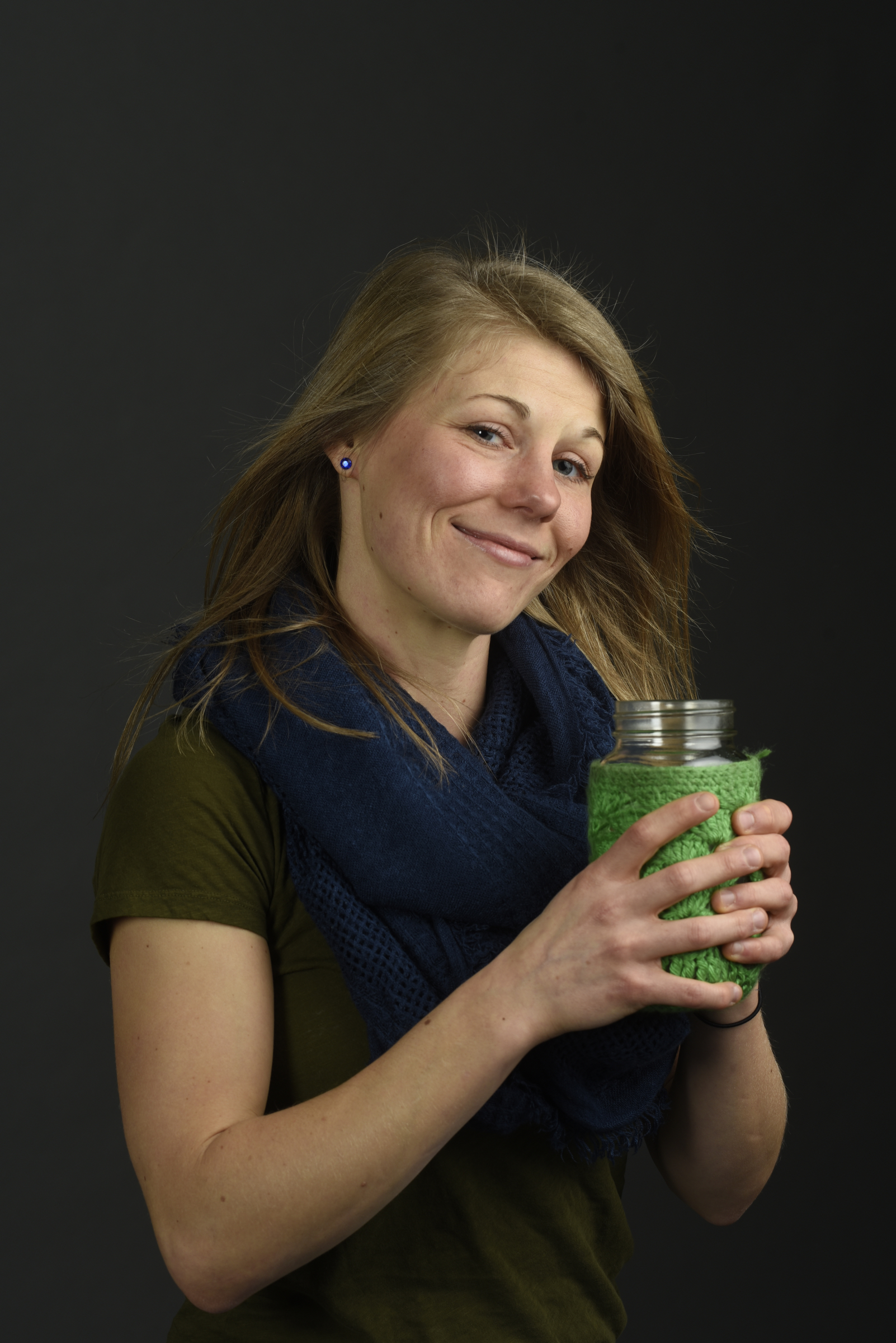 Photographed Monday, Feb. 1, 2016, in Chattanooga, Tenn., Tiffany Malapanes , the founder of Positiffitea, drinks her tea from a canning jar cushioned in a crocheted sleeve.