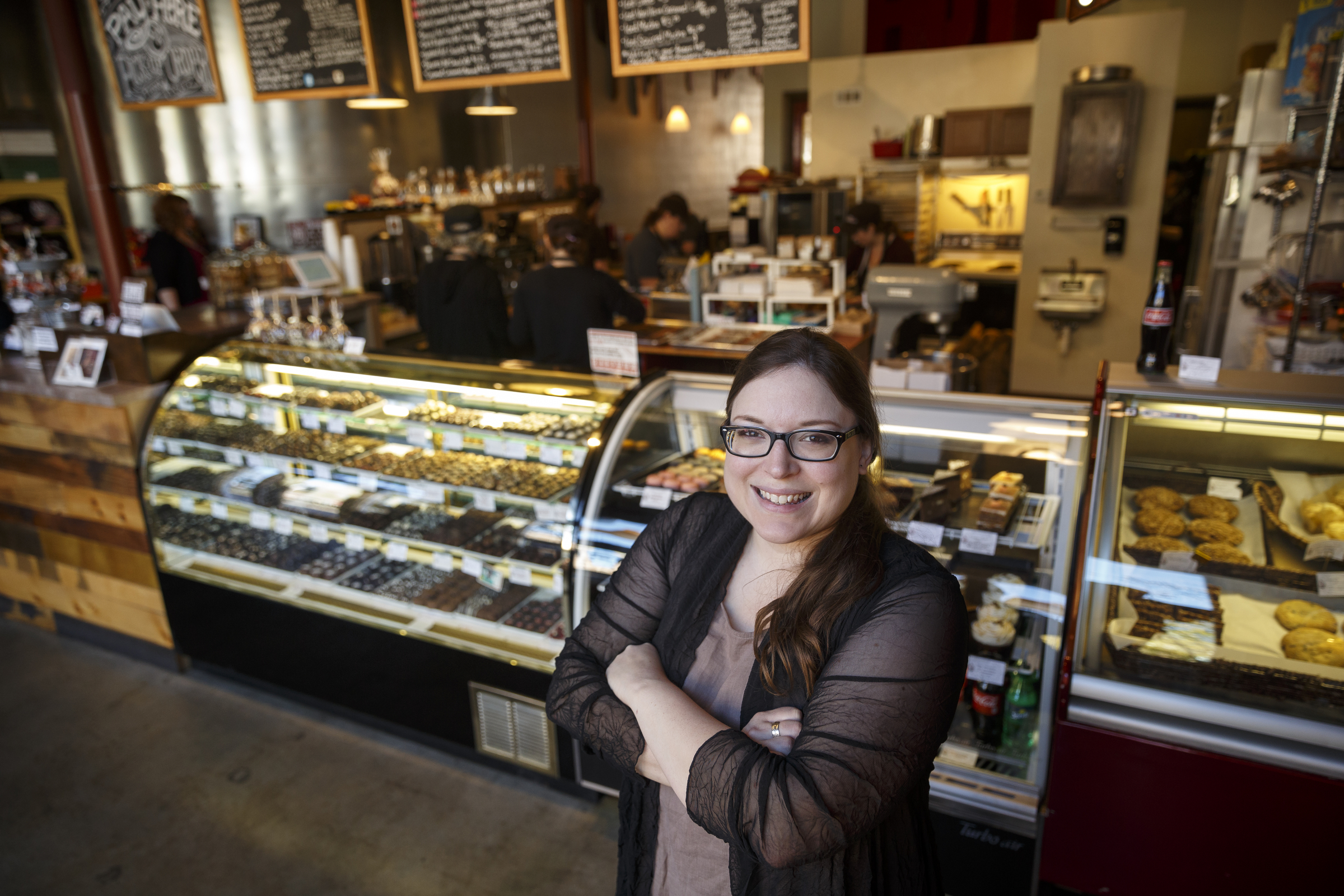 Hot Chocolatier owner Wendy Buckner stands in her business on Market Street.
