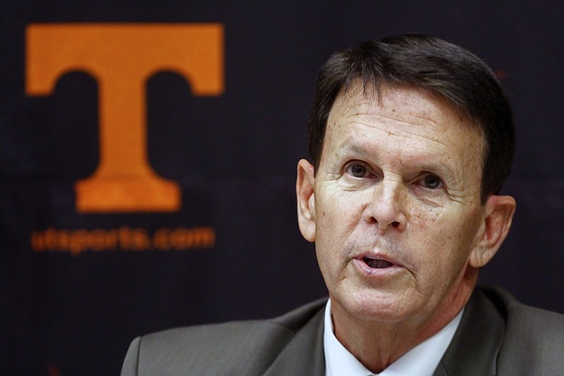 Tennessee athletic director Dave Hart speaks to reporters at a news conference on Sunday, Nov. 18, 2012, in Knoxville, Tenn., after it was announced that head football coach Derek Dooley would be replaced by offensive coordinator Jim Chaney for the final SEC regular season game against Kentucky. (AP Photo/Wade Payne)