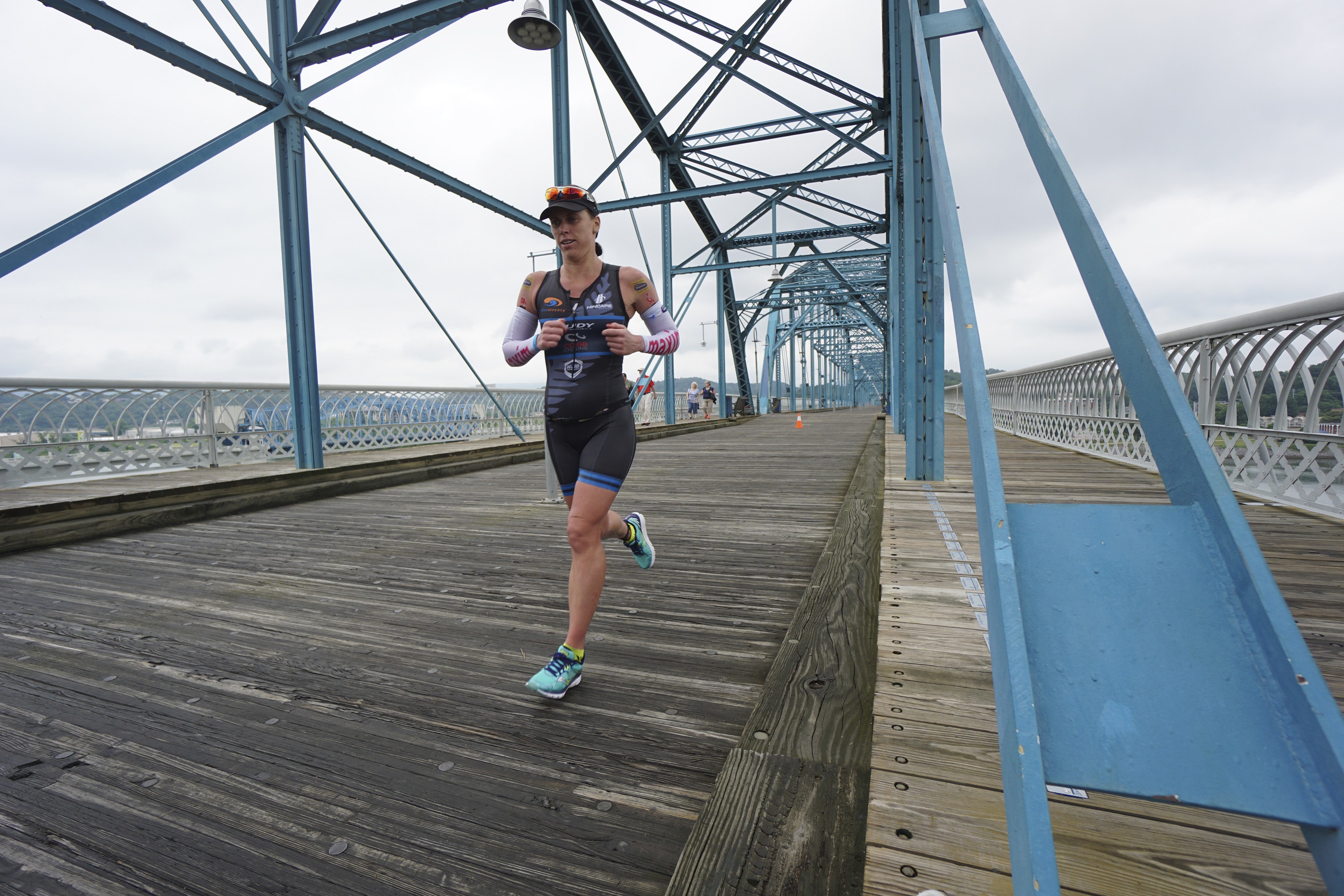 Local athlete Anna Cleaver makes her way across the Walnut Street Bridge on her way to place 10th in the professional women's field in the inaugural Sunbelt Bakery Ironman 70.3 in 2015.