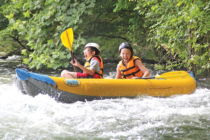 Campers enjoy the river at a Baylor summer camp.