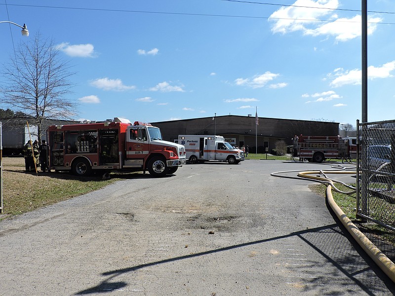 The Buy A Truck Plant in LaFayette caught fire on the back side. Everyone was told to stay behind the fence except for emergency workers. Walker County firefighters work to put out the fire on the backside of the building, while Puckett EMS loads people injured.