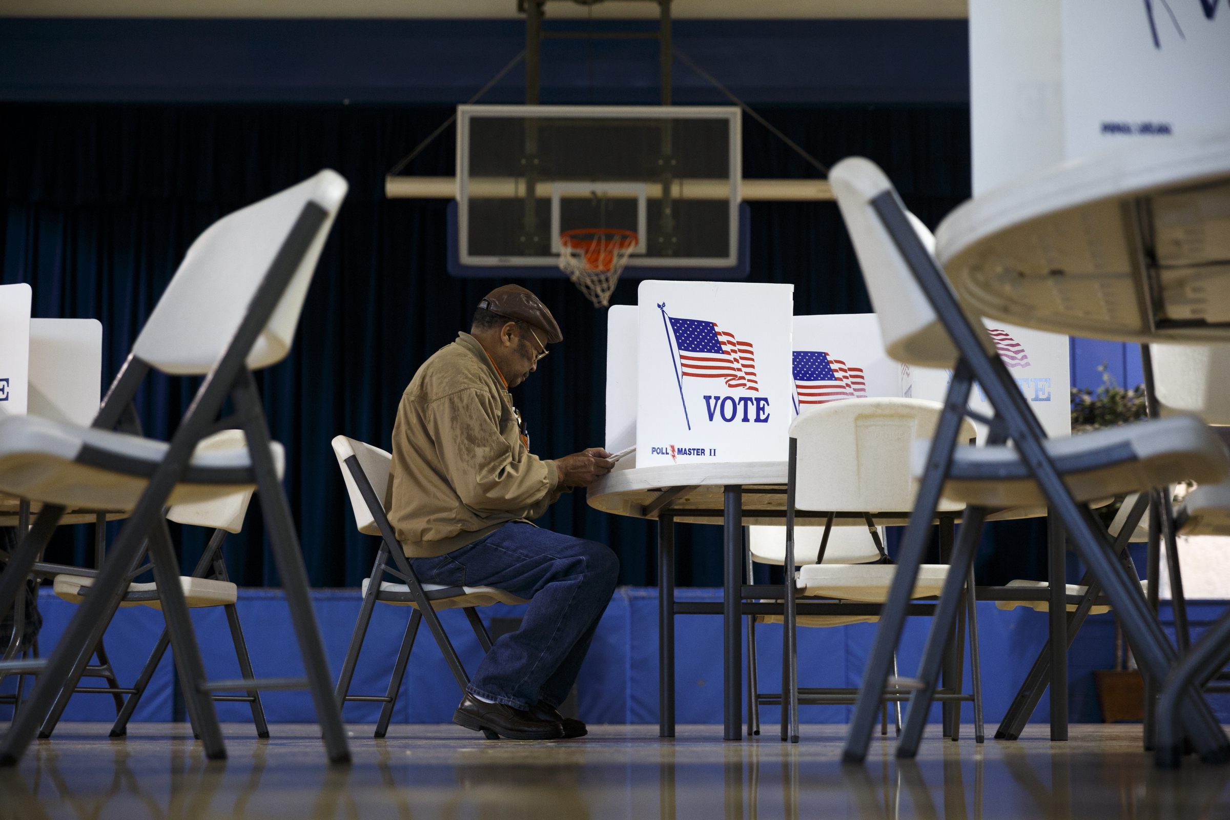 Edward Carter votes in the Super Tuesday primary election at the Bethlehem Center polling location on Tuesday, March 1, 2016, in Chattanooga, Tenn.