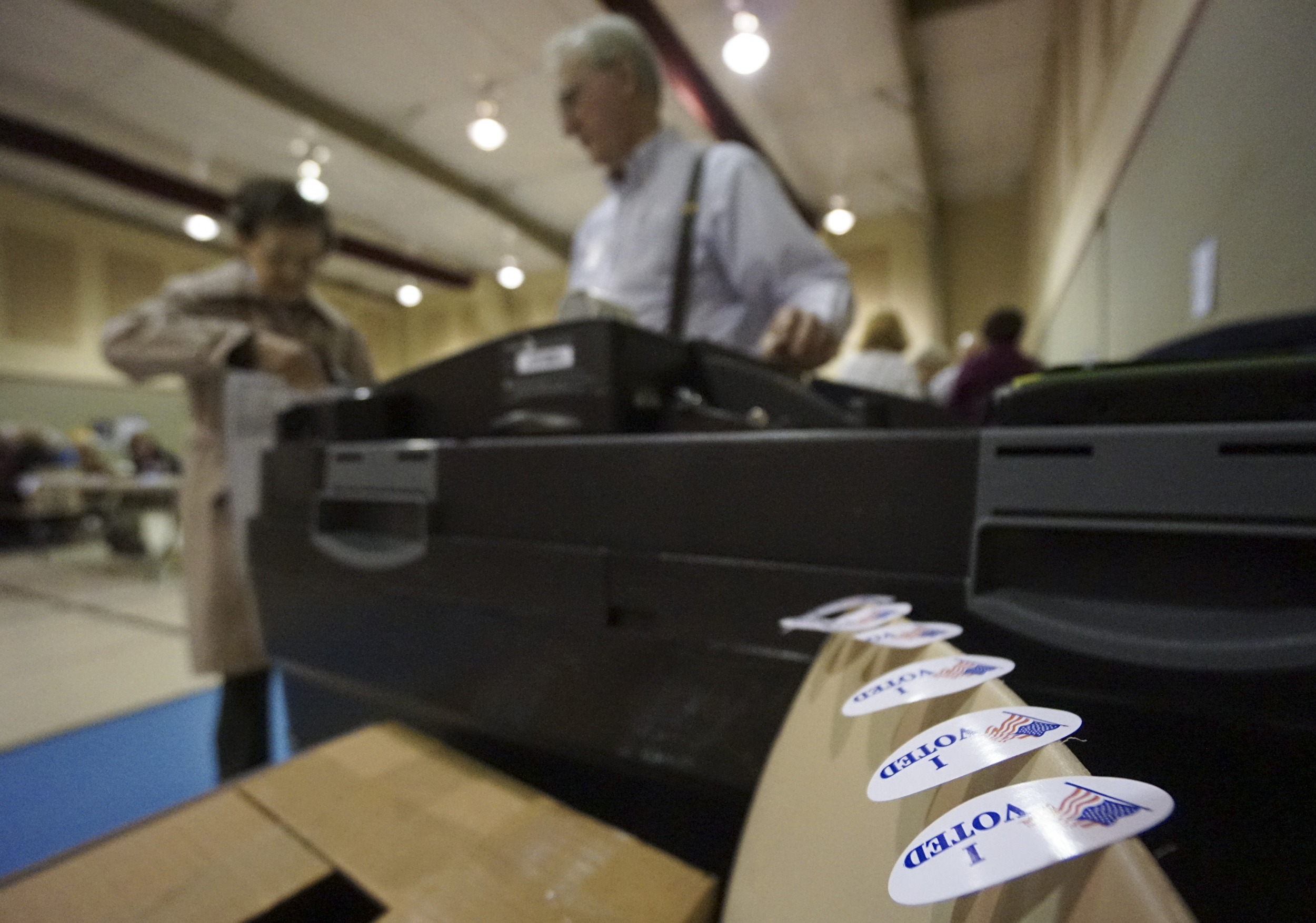 A voter enters her ballot before getting a sticker at Concord Baptist Church in East Brainerd on Super Tuesday, March 1, 2016.