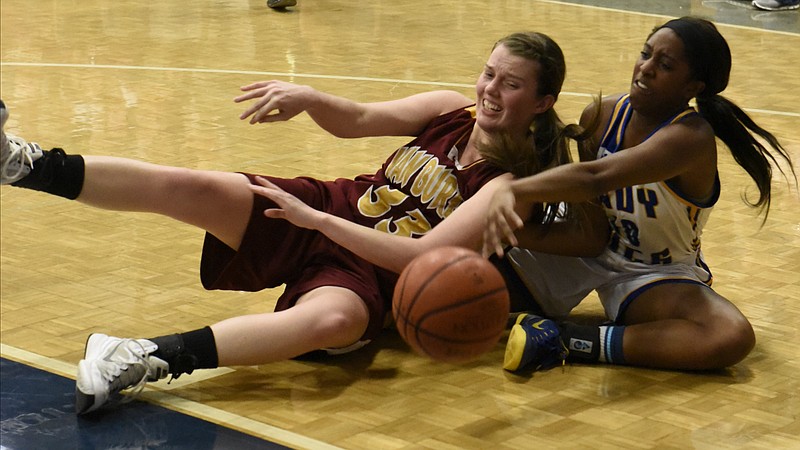 Boyd-Buchanan's Marisa McCalla, right, battles for a loose ball with Allison McCoy as Van Buren County defeats Boyd-Buchanan by a score of 57-38 in the Region 3-A girls' basketball championship game at the Chattanooga School for the Arts and Sciences  on Wednesday, Mar. 2, 2016, in Chattanooga, Tenn. 