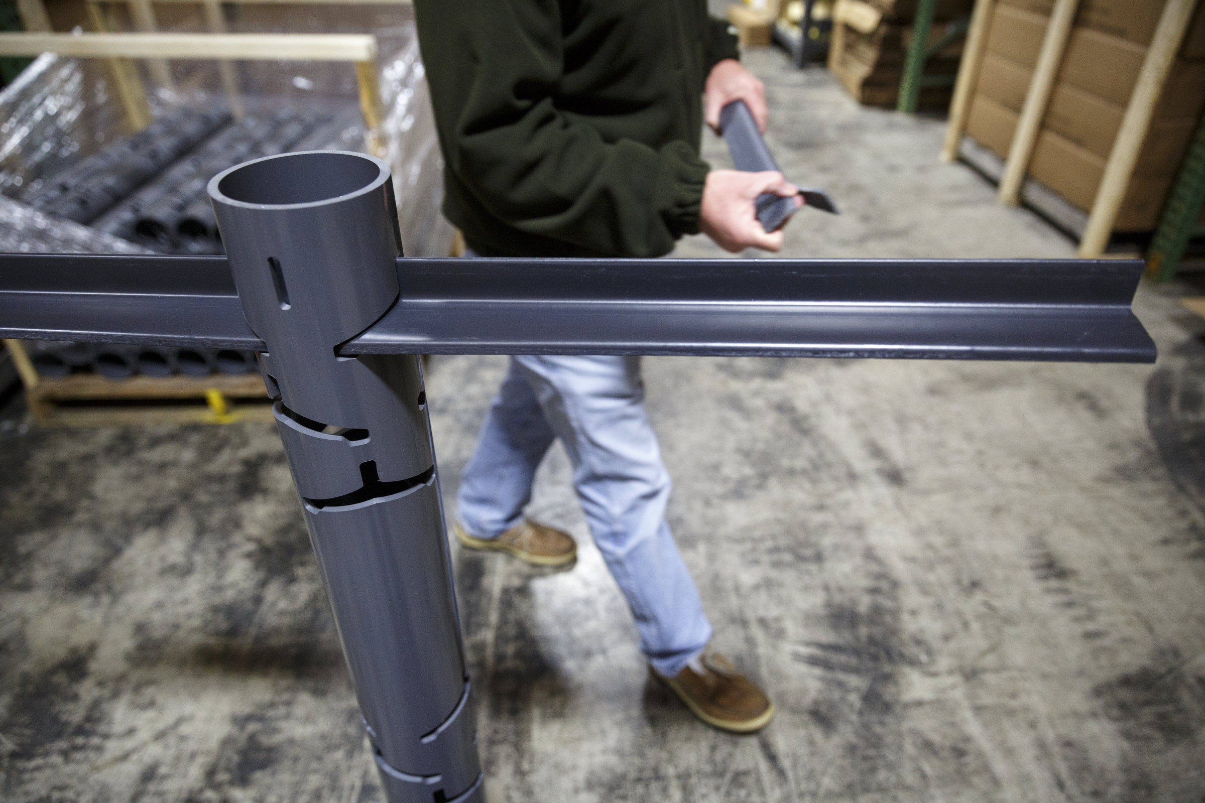 Businessman Matt Marsden assembles his fish attractor, called the American Fish Tree, at a warehouse Friday, Feb. 19, 2016, in Soddy-Daisy, Tenn. The device, which is made from PVC, can be dropped into a lake to provide an artificial fish habitat by providing shelter and shade.