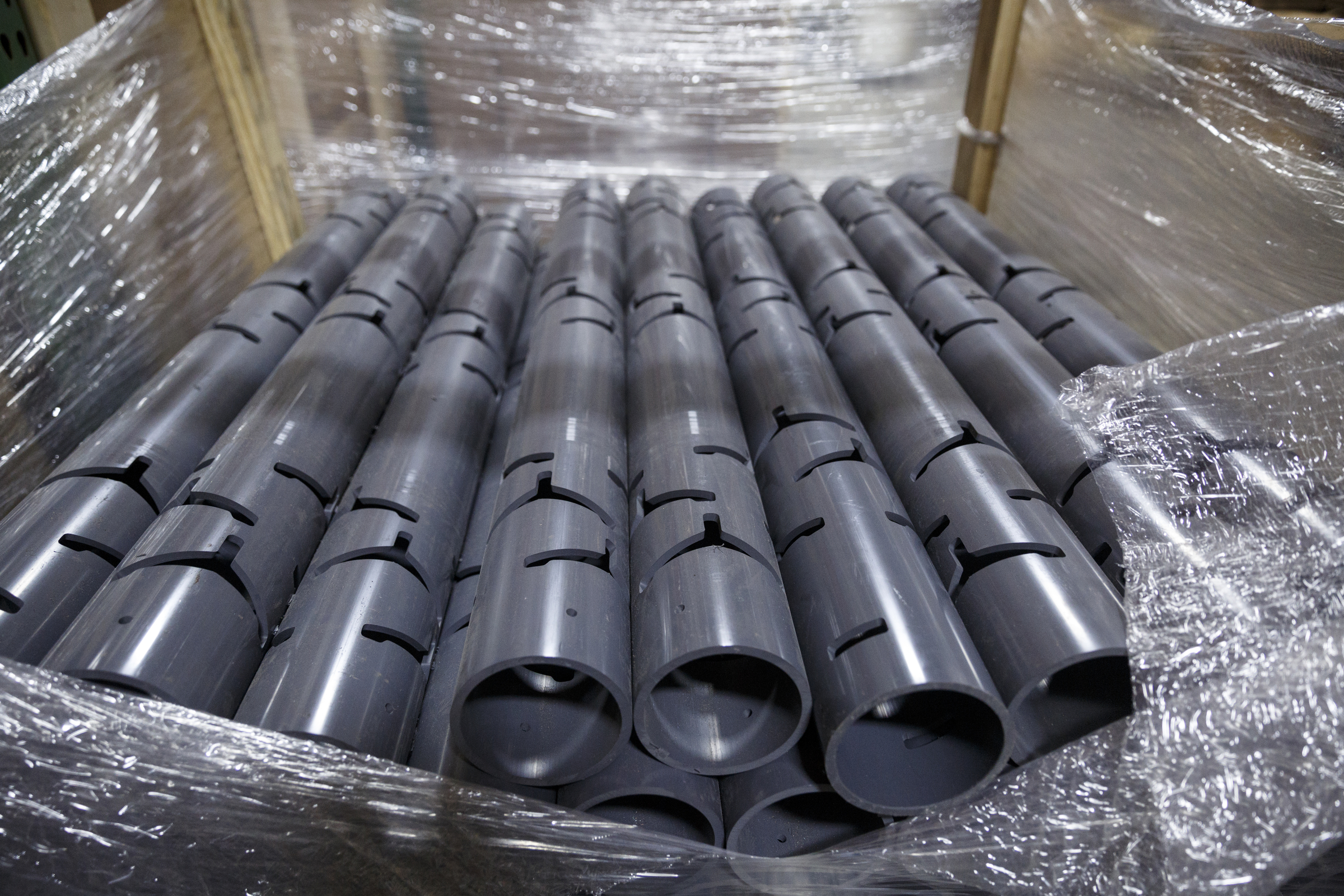 The PVC stems for a fish attractor made by Matt Marsden, called the American Fish Tree, are stack on a pallet at a warehouse Friday, Feb. 19, 2016, in Soddy-Daisy, Tenn. The device, which is made from PVC, can be dropped into a lake to provide an artificial fish habitat by providing shelter and shade.