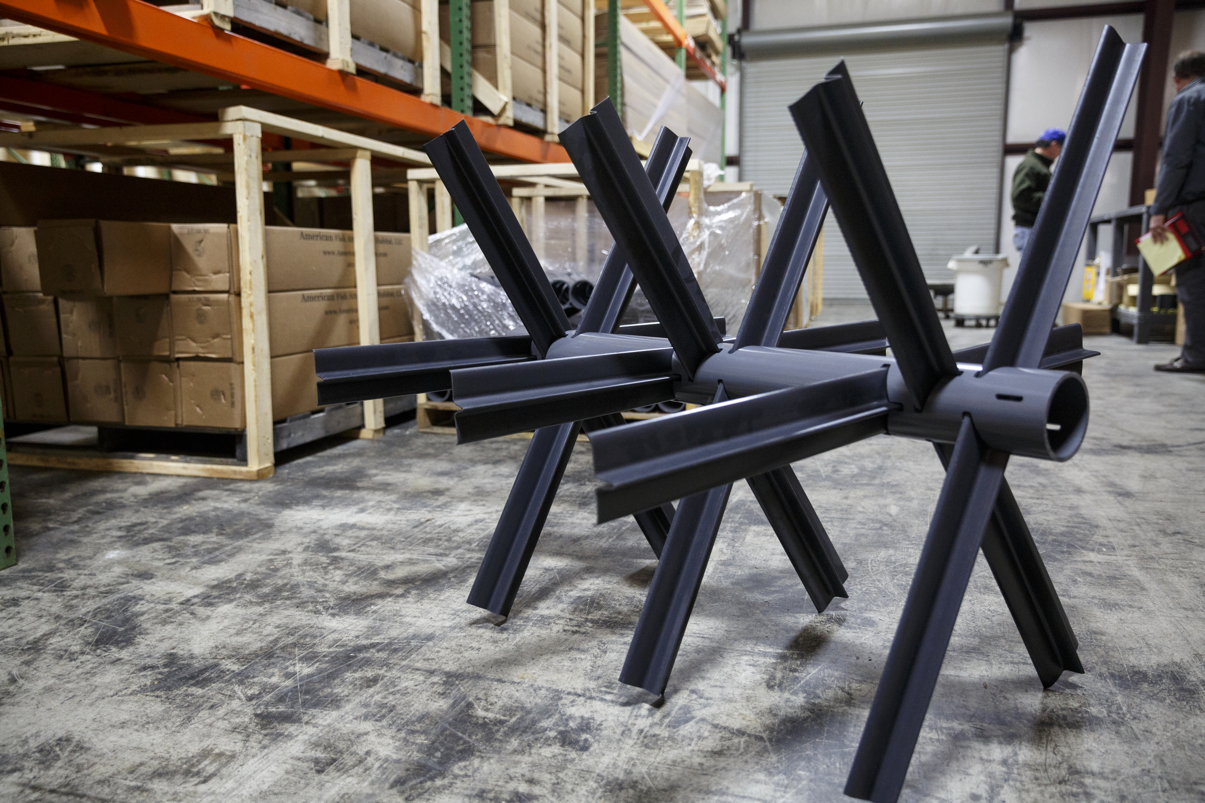 The fish attractor made by Matt Marsden, called the American Fish Tree, is assembled at a warehouse Friday, Feb. 19, 2016, in Soddy-Daisy, Tenn. The device, which is made from PVC, can be dropped into a lake to provide an artificial fish habitat by providing shelter and shade.