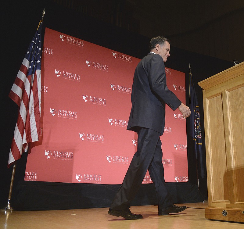 
              Former Republican presidential candidate Mitt Romney walks across stage at Libby Gardner Hall to make a speech about the state of the 2016 presidential race and Donald Trump at the University of Utah Thursday, March 3, 2016, in Salt Lake City. The 2012 GOP presidential nominee has been critical of front-runner Donald Trump on Twitter in recent weeks and has yet to endorse any of the candidates. (Al Hartmann/The Salt Lake Tribune via AP) DESERET NEWS OUT; LOCAL TELEVISION OUT; MAGS OUT; MANDATORY CREDIT
            