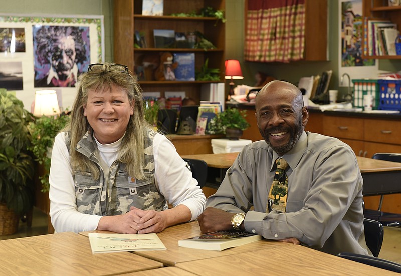 Brown Middle School sixth-grade social studies teacher Dr. Katie Hawkins and assistant principal Dr. Sylvester Carrington both recently authored books.