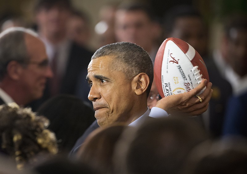 President Barack Obama, pretending to throw a football during a ceremony honoring the University of Alabama football team earlier this week, tossed out a whopper Thursday in blaming the upopularity of the Affordable Care Act on Republicans.