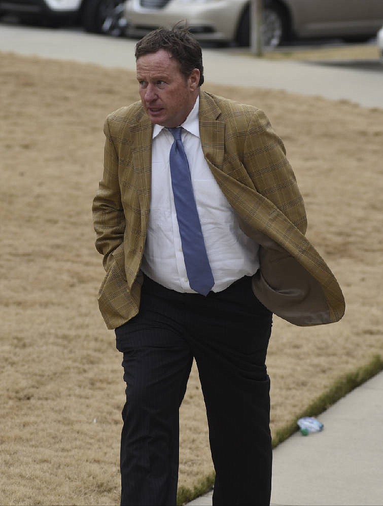 Trent Tolbert, co-founder and chief acquisitions officer of New Beginnings Care, walks back to the U. S. Bankruptcy Court on Monday, Feb. 8, in Chattanooga, Tenn., during a recess in proceedings involving his company.