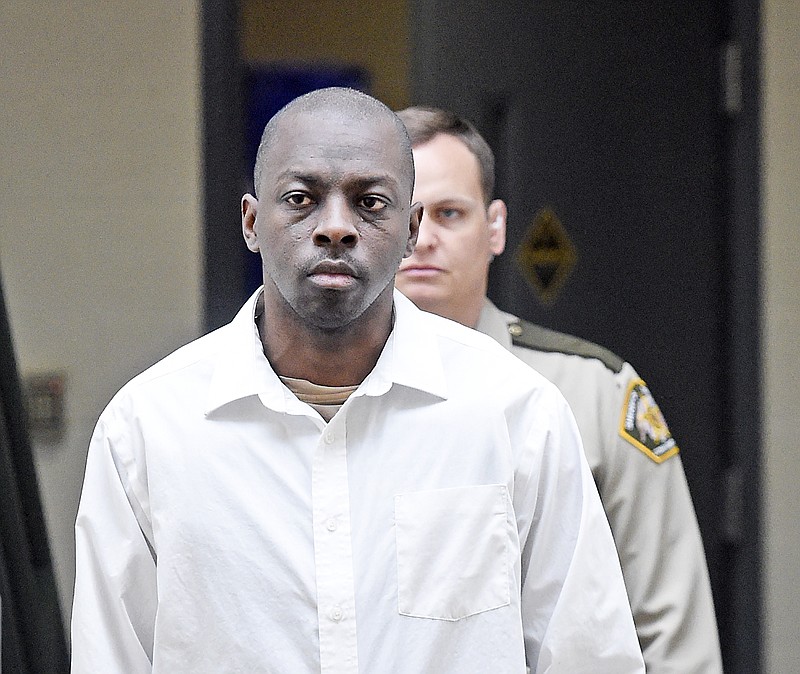 Stephon Lindsay walks to the Judicial Building in Gadsden, Ala., Thursday, Feb. 25, 2016. Lindsay is charged with capital murder in the 2013 death of his 20-month-old daughter Maliyah. Investigators' have said in a warrant that the girl was partially decapitated with a small hatchet and news media outlets have quoted relatives as saying she was likely killed as part of a ritual.