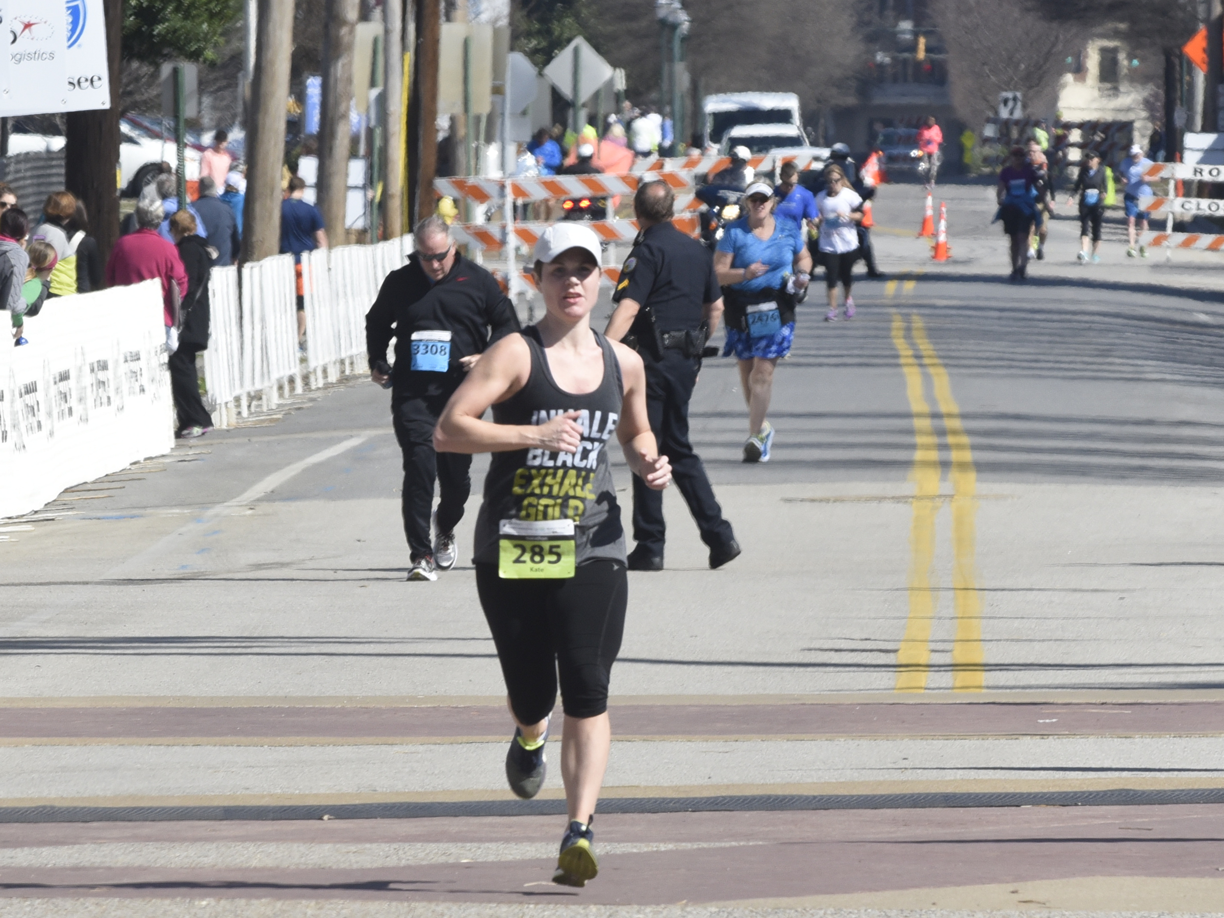 Female full marathon winner Kate Kokal from Pittsburg, Penn., nears the finish line at the Chattanooga Marathon on Sunday, Mar. 6, 2016, in Chattanooga, Tenn.