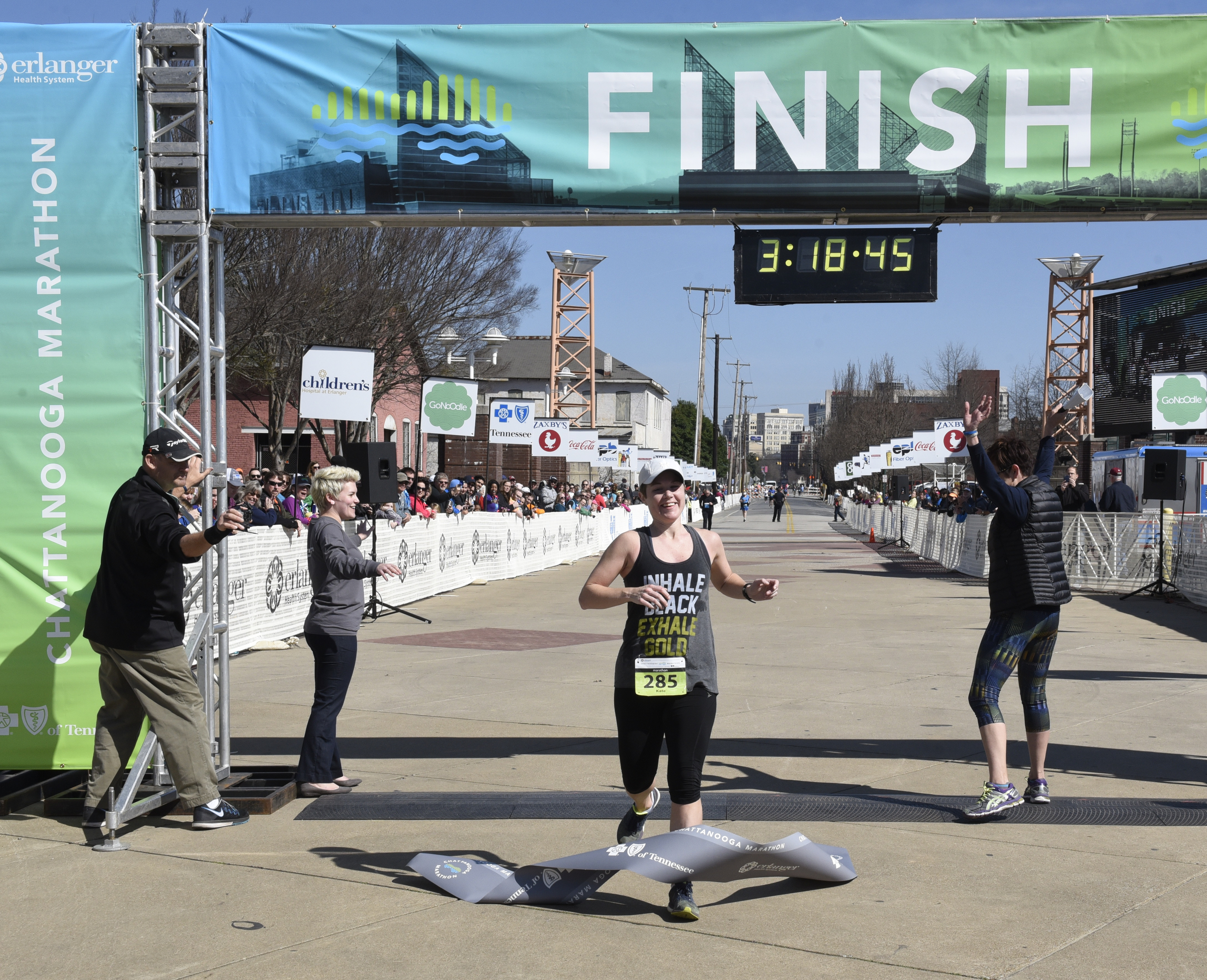 Female full marathon winner Kate Kokal from Pittsburg, Penn., crosses the finish line at the Chattanooga Marathon on Sunday, Mar. 6, 2016, in Chattanooga, Tenn.