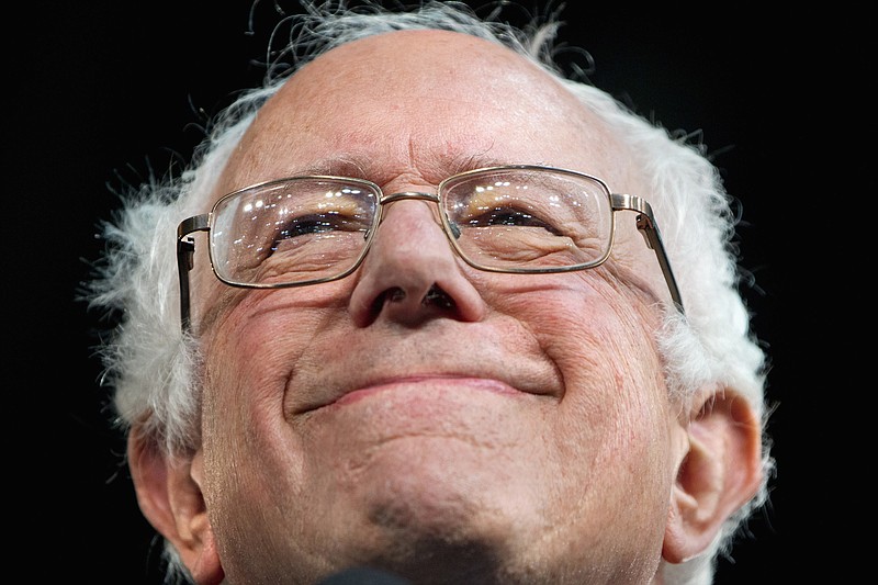  In this Feb. 24, 2016 file photo, Democratic presidential candidate, Sen. Bernie Sanders, I-Vt. smiles while speaking during a campaign event in Kansas City, Mo. Sanders and Republican hopeful Marco Rubio are following GOP rival Ted Cruz into Kansas in the final days before the state's presidential caucuses. Sanders is having a Thursday evening rally in Lawrence. Rubio expanded his planned campaign swing Friday to three events. His swing comes after Cruz visited a barbecue restaurant Wednesday in Olathe, and had a rally in Overland Park. (AP Photo/Jacquelyn Martin, File)