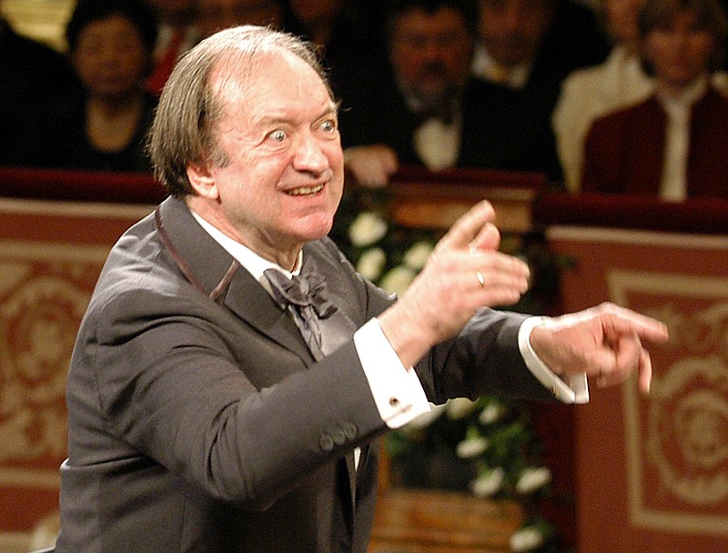 
              FILE In this Jan. 1, 2003 file picture Nikolaus Harnoncourt conducts the Vienna Philharmonic Orchestra during the traditional New Year's concert at the Musikverein in Vienna, Austria. Conductor Nikolaus Harnoncourt is dead after a career characterized by a search for authenticity in Baroque and other classical music. His death at 87 Saturday night was confirmed Sunday March 6, 2016  by the Gesellschaft der Musikfreunde in Wien (Society of Friends of Music in Vienna,) which was closely associated with Harnoncourt.  (AP Photo/Terry,file)
            