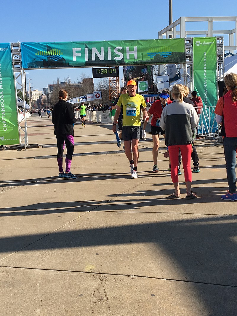 Runners in the Chattanooga half marathon cross the finish line
