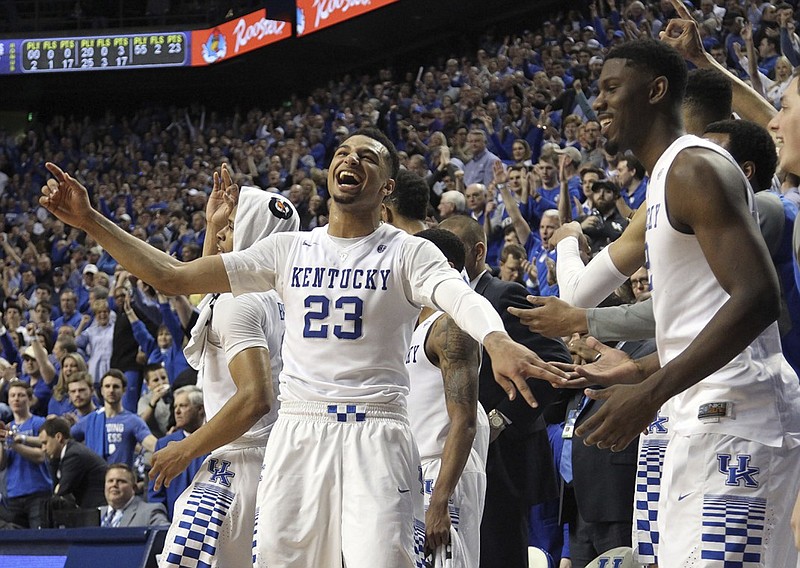 Kentucky's Jamal Murray (23) and Alex Poythress celebrate during Saturday's 94-77 win over LSU. The Wildcats are seeded second in this week's SEC tournament.