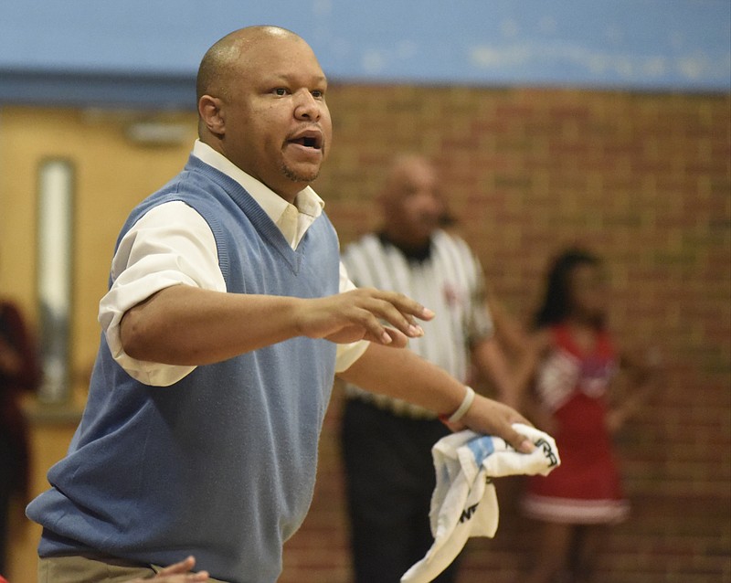 Brainerd coach Levar Brown watches from the sideline as Brainerd hosts York Institute in a Class AA state basketball sectional game on Monday, Mar. 7, 2016, in Chattanooga, Tenn. 