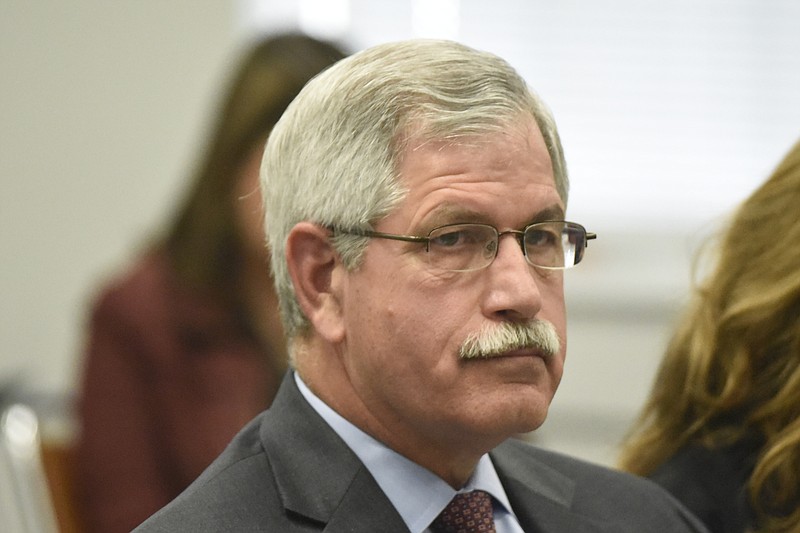 Rick Smith listens during the meeting of the Hamilton County School Board on Monday. Smith remains as superintendent.