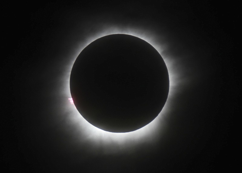 
              A total solar eclipse is seen in Belitung, Indonesia, Wednesday, March 9, 2016. A total solar eclipse was witnessed along a narrow path that stretched across Indonesia while in other parts of Asia a partial eclipse was visible. (AP Photo)
            