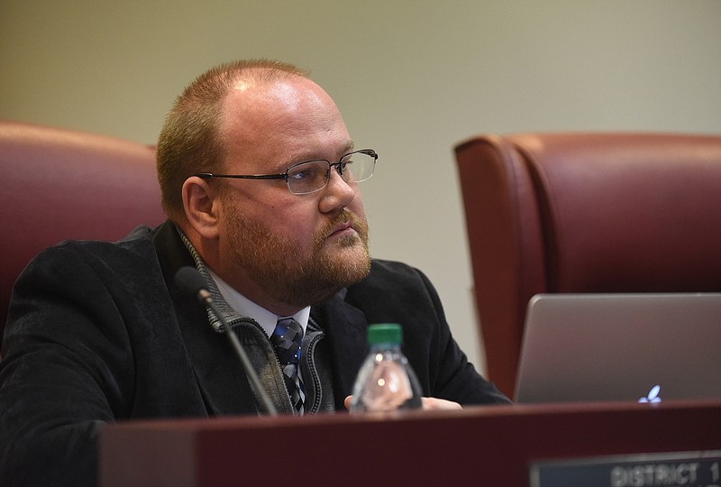 Board member Chris Turner attends a meeting Thursday at the Bradley County Board of Education.