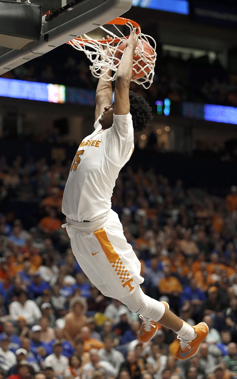 Tennessee's Detrick Mostella (15) dunks against Auburn during the first half of an NCAA college basketball game in the Southeastern Conference tournament in Nashville, Tenn., Wednesday, March 9, 2016. (AP Photo/John Bazemore)