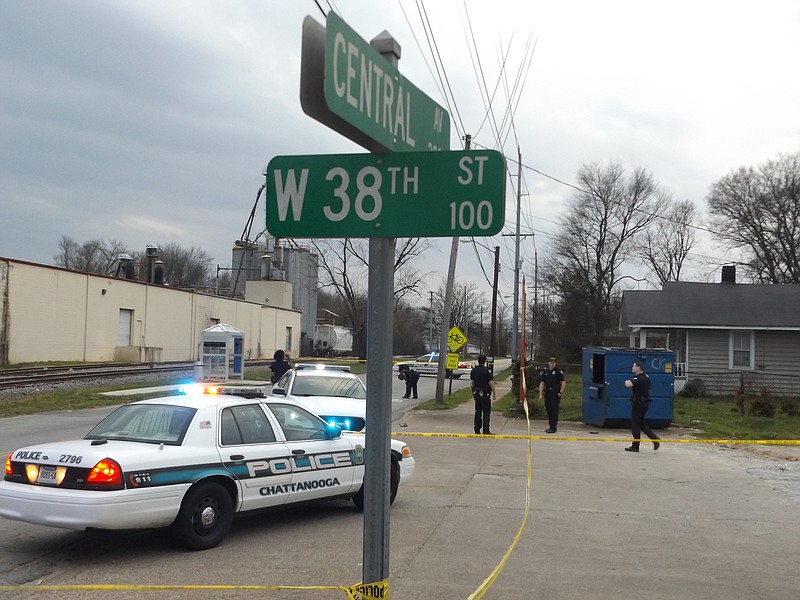 Chattanooga police work the scene of a drive-by shooting that wounded one male in the ankle shortly before 6 p.m. Thursday on a parking lot at W. 38th Street and Central Ave. There were two men wearing ski masks who drove by in a sedan, according to Lt. Jerri Sutton.