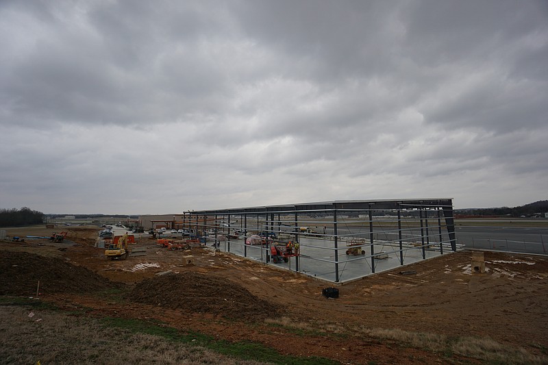 Staff Photo by Dan Henry / Construction continues on the latest new Wilson Air Center hangar at Chattanooga Metropolitan Airport.