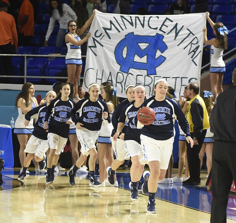 The McMinn Central team takes the floor as they prepare to play Upperman High School in the TSSAA girls' state basketball tournament on Friday, Mar. 11, 2016, at Middle Tennessee State University in Murfreesboro, Tenn. 