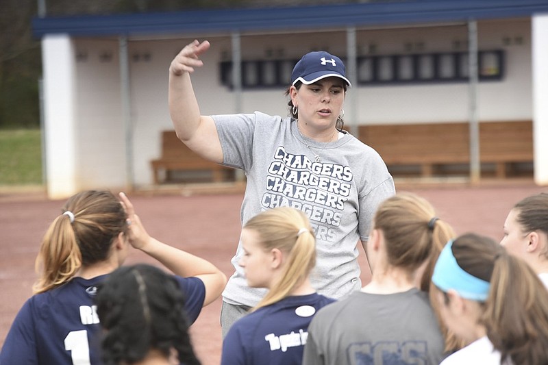 Chattanooga Christian softball coach Lisa Gray talks to her team Friday during an orientation before practice.