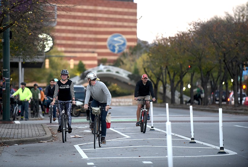 Cyclists ride down a bike lane on Broad Street on Nov. 10, 2015.