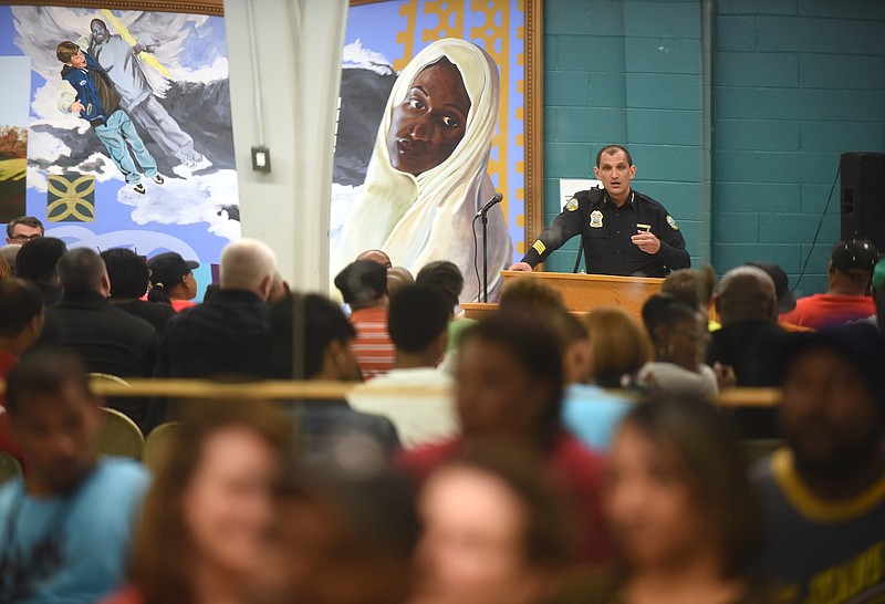 Chief Fred Fletcher speaks to a crowd Tuesday, March 15, 2016 at Carver Recreation Center.