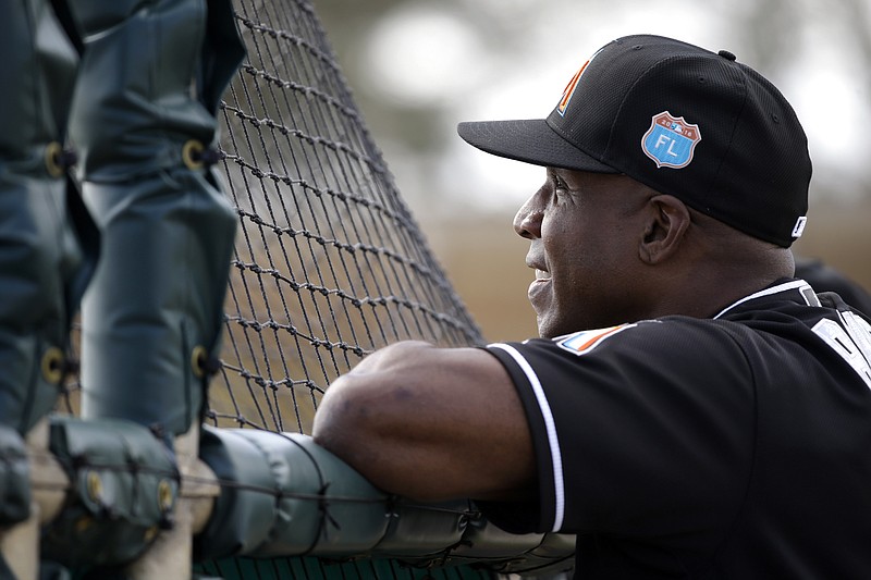 Miami Marlins' Giancarlo Stanton looks on during batting practice