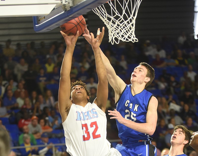 Christian Academy of Knoxville's Bill Bower guards Brainerd's Jesse Walker Thursday, March 17, 2016 at Murphy Center at Middle Tennessee State University.