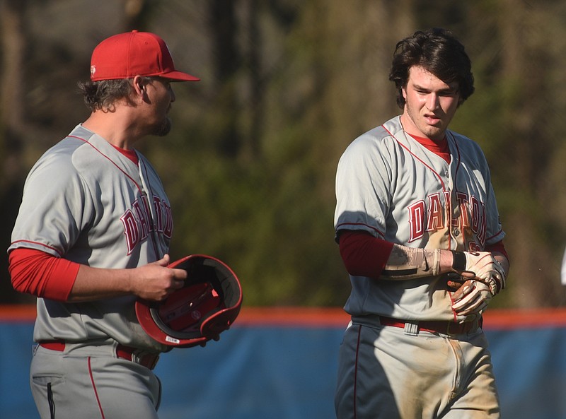 Dalton High School baseball coach Rhett Parrott, left, talks with Brock Nelson during the Catamounts' game Wednesday at Northwest Whitfield. Nelson is leading Dalton with a .581 batting average and is 2-0 as a pitcher this season.