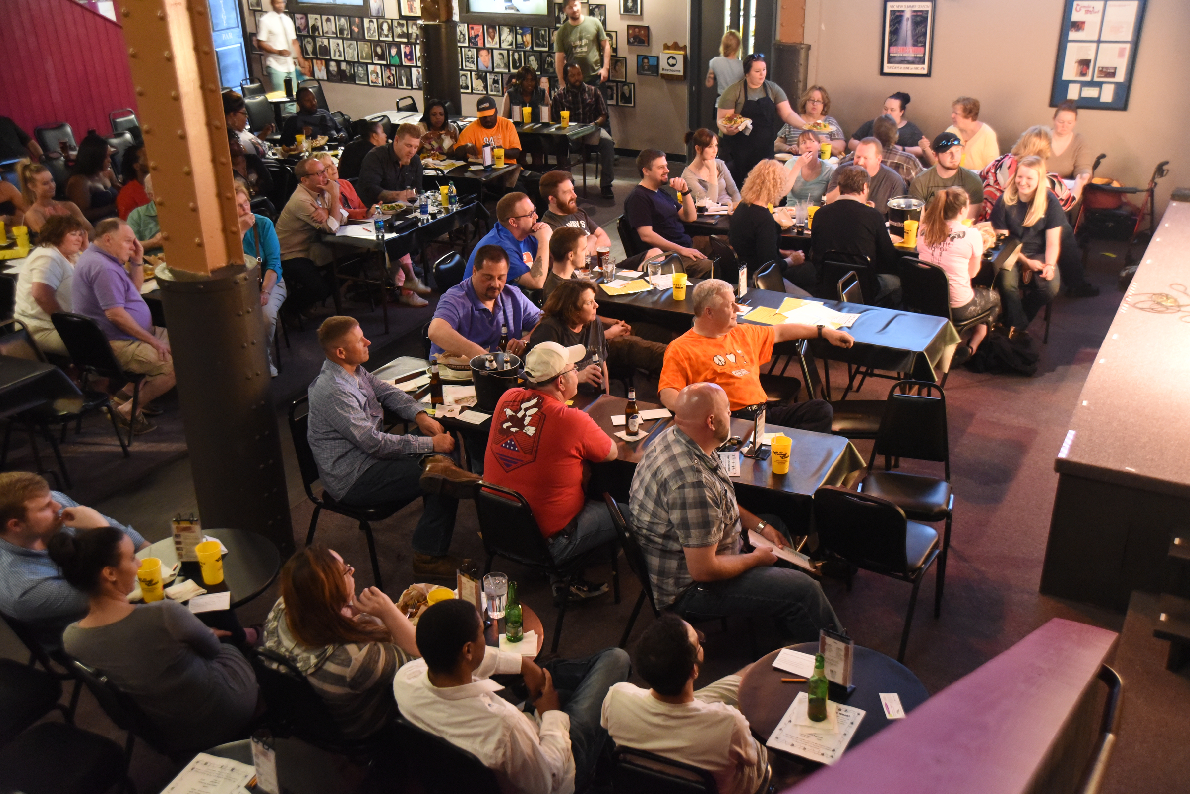 People watch as local comics compete on Wednesday, March 16, 2016 at Chattanooga's Comedy Catch.