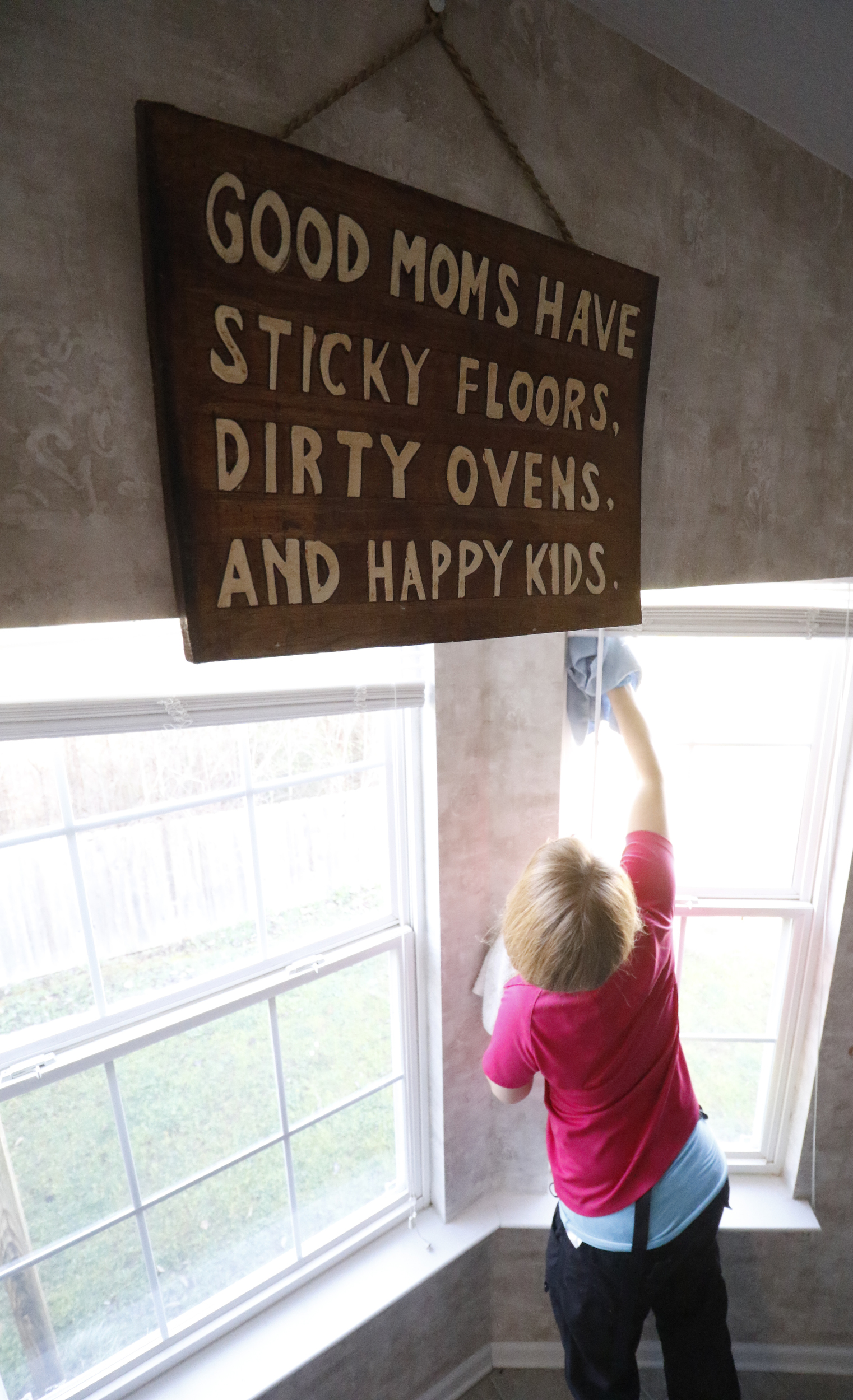 Staff Photo by Dan Henry / The Chattanooga Times Free Press- 3/15/16. Jessica Kittle, 31, with Two Maids and a Mop cleaning service, performs a deep clean on Jacob McDonald's residence on Tuesday, March 15, 2016.