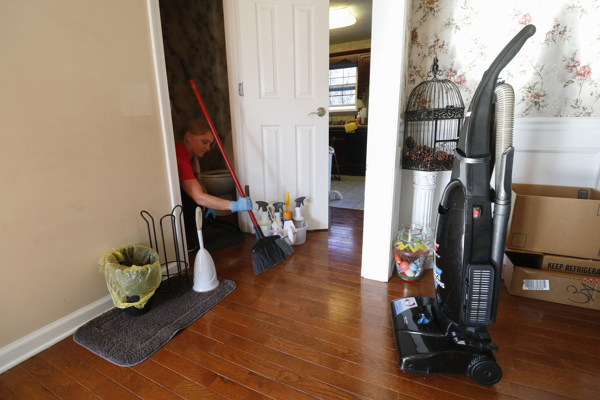 Staff Photo by Dan Henry / The Chattanooga Times Free Press- 3/15/16. Jessica Kittle, 31, with Two Maids and a Mop cleaning service, performs a deep clean on Jacob McDonald's residence on Tuesday, March 15, 2016.